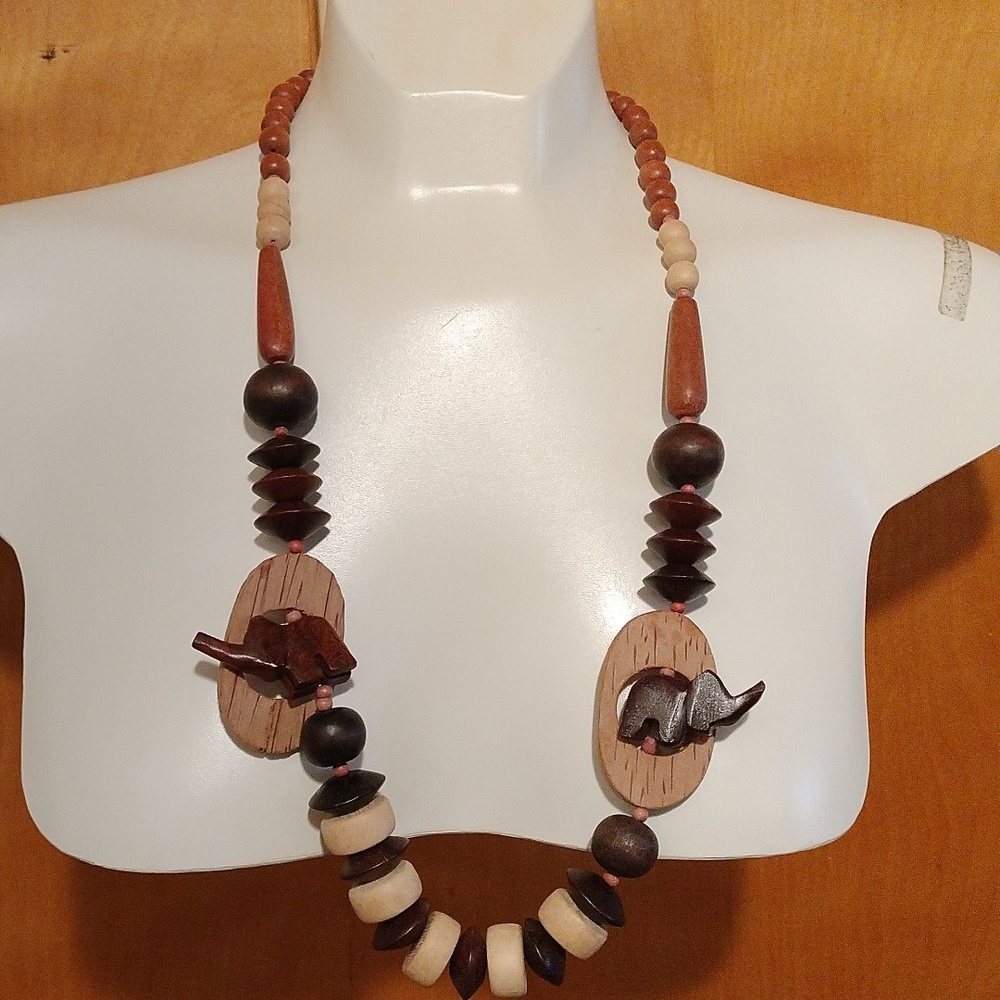 Hand Crafted Black and brown wooden bead necklace with elephants. Length 14 inch